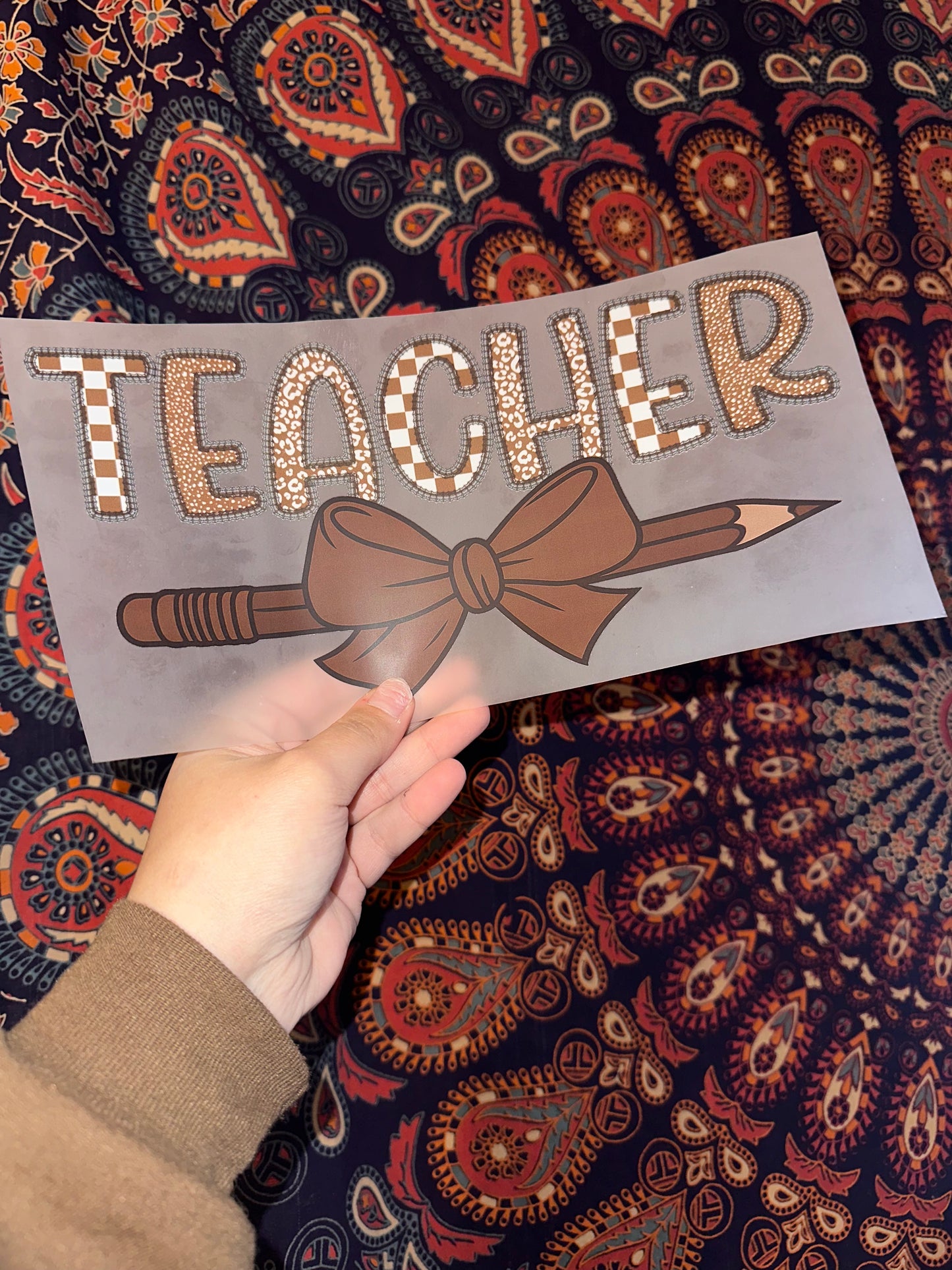 Teacher- E